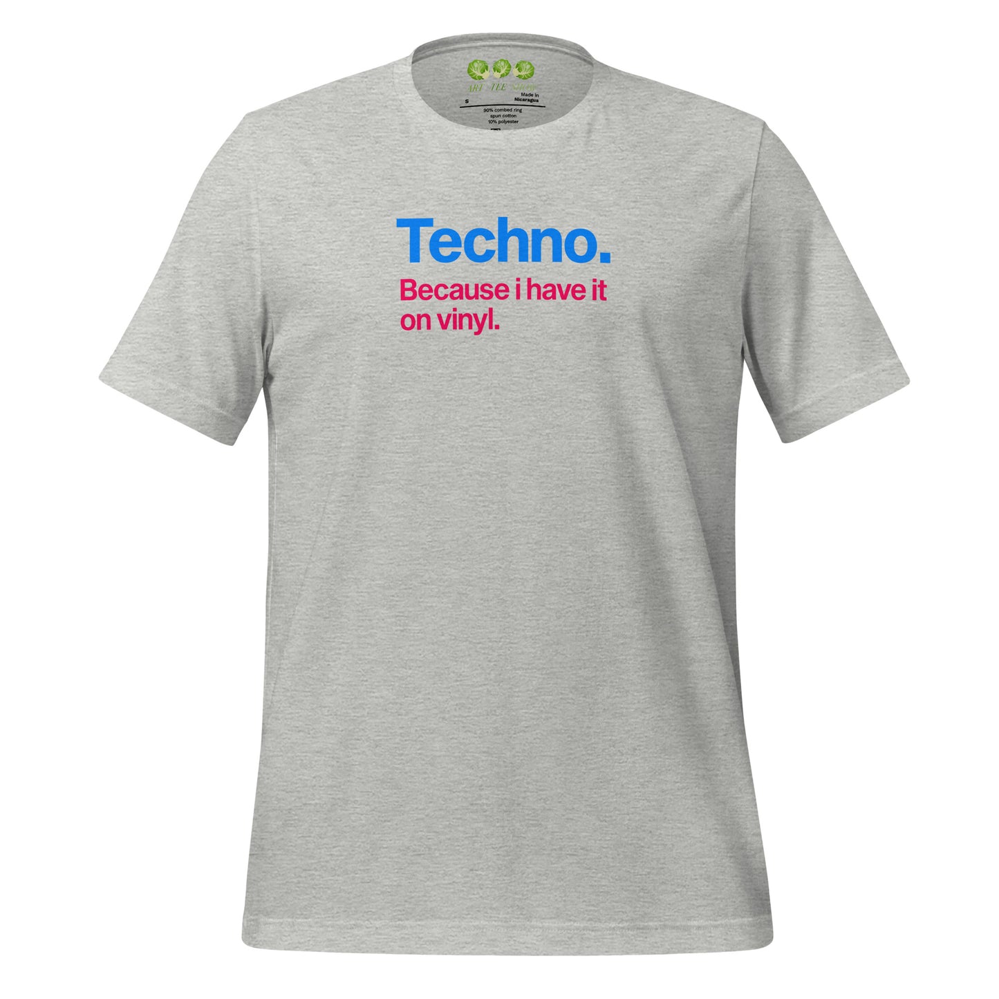 A Heather unisex t-shirt featuring minimalist typography on the chest. The text reads "Techno." in bold blue letters, followed by the subtext "Because i have it on vinyl." in pink. Designed for electronic music fans and vinyl collectors.
