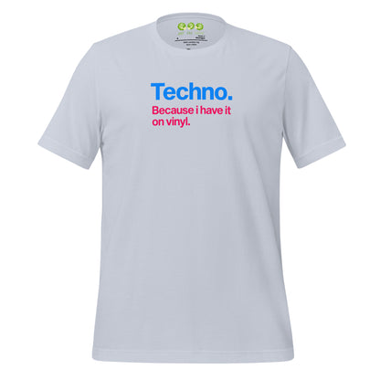 A light blue unisex t-shirt featuring minimalist typography on the chest. The text reads "Techno." in bold blue letters, followed by the subtext "Because i have it on vinyl." in pink. Designed for electronic music fans and vinyl collectors.