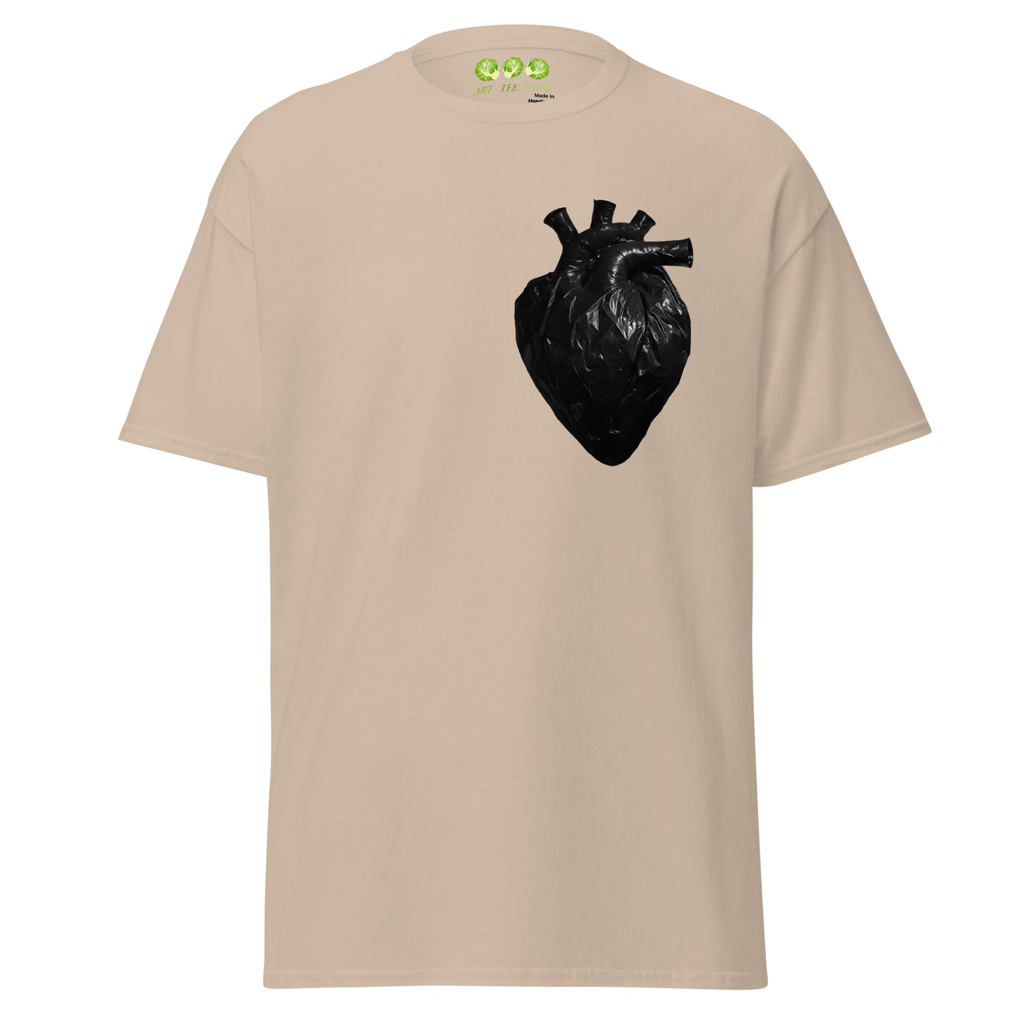 Sand coloured unisex t-shirt with a realistic black plastic trash bag anatomical heart graphic on the left chest. Grunge aesthetic streetwear design.